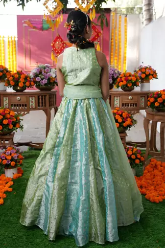 Enchanting pastel green lehenga set with golden embroidery