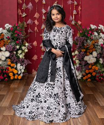 Elegant black-and-white floral lehenga set with crop top and dupatta 1
