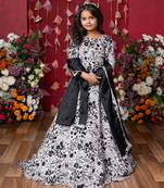 Elegant black-and-white floral lehenga set with crop top and dupatta