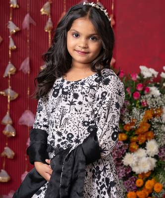 Elegant black-and-white floral lehenga set with crop top and dupatta 2