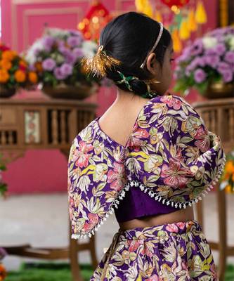 Elegant embroidered lehenga with attached floral cape and matching potli bag 3