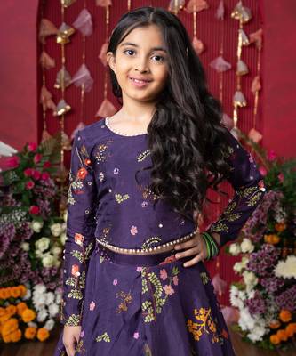 A stunning floral-printed peplum top with a matching lehenga for a regal yet trendy look! 2
