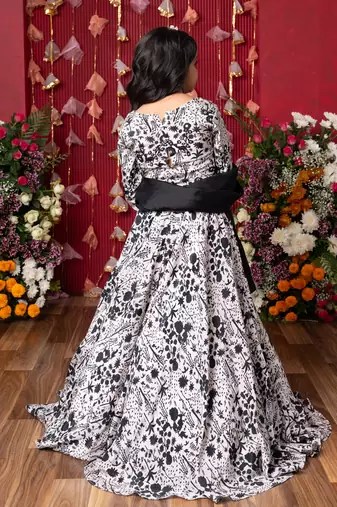 Elegant black-and-white floral lehenga set with crop top and dupatta