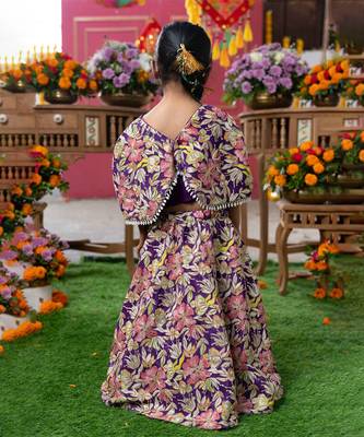 Elegant embroidered lehenga with attached floral cape and matching potli bag 4