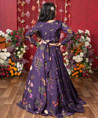 A stunning floral-printed peplum top with a matching lehenga for a regal yet trendy look! 3