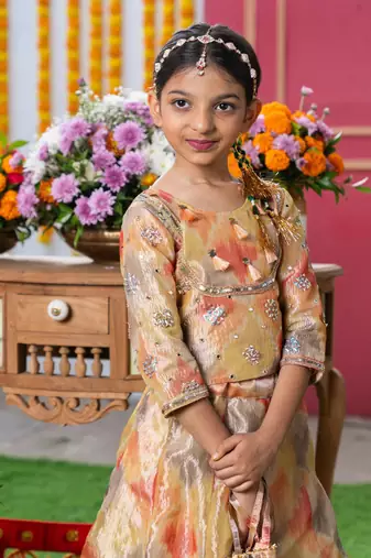 Golden glow: festive ikat print lehenga set for kids