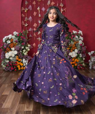 A stunning floral-printed peplum top with a matching lehenga for a regal yet trendy look! 4