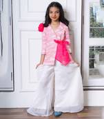 Trendy pink blazer jacket with bow belt and white palazzo set