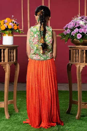 Embroidered jacket-style blouse with mirror work and vibrant sharara pants