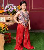 Vibrant embroidered kurti with tassels and red mirror work sharara pants