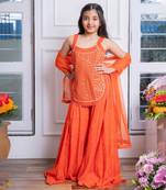 Vibrant orange mirror work sharara set with embroidered crop top and dupatta