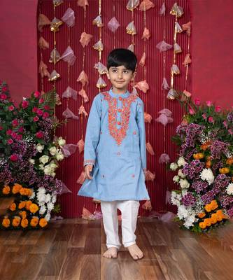 Stylish sky blue soft denim kurta with vibrant embroidery and white pants 1