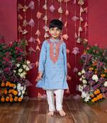 Stylish sky blue soft denim kurta with vibrant embroidery and white pants