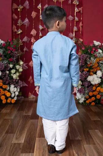 Stylish light blue soft denim kurta with lime green embroidery and white pants
