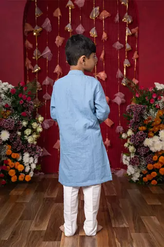 Stylish sky blue soft denim kurta with vibrant embroidery and white pants