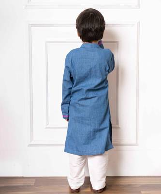 Charming blue soft denim kurta with vibrant pink embroidery and white pants 3