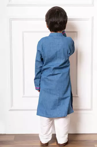 Charming blue soft denim kurta with vibrant pink embroidery and white pants