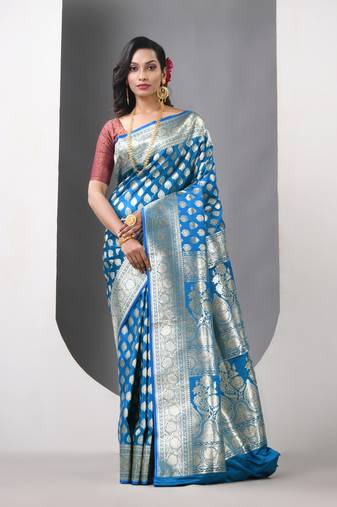 Sky blue and green duel tone katan silk blend banarasi saree with zari woven ethnic designs