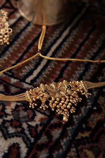 Necklace and Earring Set with Intricate Gold Design