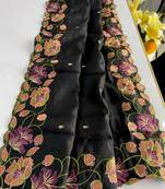 Black tussar silk saree with all over contrast embroidery work and motifs with cutwork border