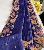 Navy blue tussar silk saree with all over contrast embroidery work and motifs with cutwork border