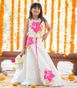 Exquisite floral embroidered top and lehenga with potli bag