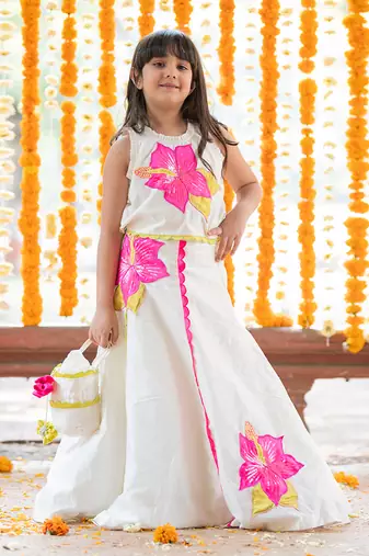 Exquisite floral embroidered top and lehenga with potli bag