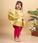 Vibrant lime green printed kurta paired with bold fuchsia dhoti pants for a festive and playful look