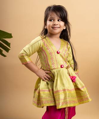 Vibrant lime green printed kurta paired with bold fuchsia dhoti pants for a festive and playful look 2