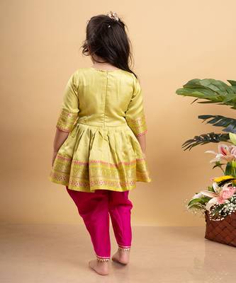 Vibrant lime green printed kurta paired with bold fuchsia dhoti pants for a festive and playful look 3