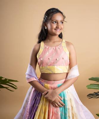 Elegant multicolored brocade lehenga set with intricate gold motifs and a matching pastel dupatta 2