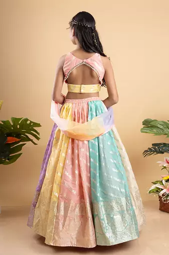 Elegant multicolored brocade lehenga set with intricate gold motifs and a matching pastel dupatta