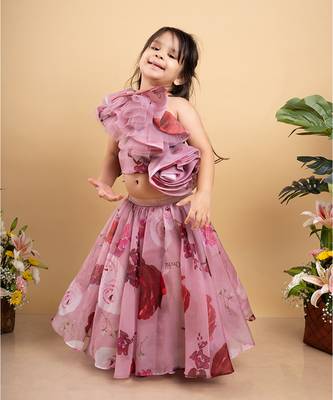 Charming off-shoulder pink ruffle top paired with a flowy floral lehenga for a delightful festive look 1