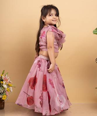 Charming off-shoulder pink ruffle top paired with a flowy floral lehenga for a delightful festive look 3