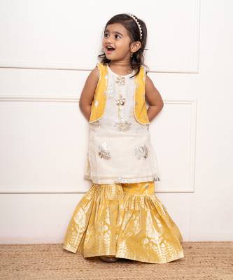 Charming ivory and yellow sharara set with delicate silver floral embroidery and playful appliqu  s 1