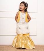 Charming ivory and yellow sharara set with delicate silver floral embroidery and playful appliqu  s