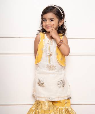 Charming ivory and yellow sharara set with delicate silver floral embroidery and playful appliqu  s 2