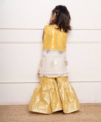 Charming ivory and yellow sharara set with delicate silver floral embroidery and playful appliqu  s 3