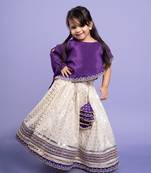 Elegant purple cape-style top with a white lehenga  set