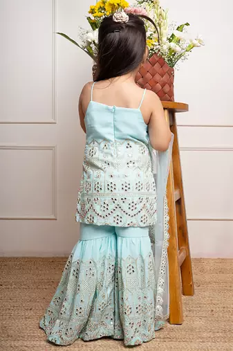 Elegant aqua blue sharara set with intricate mirror work and embroidery, perfect for festive occasions and celebrations