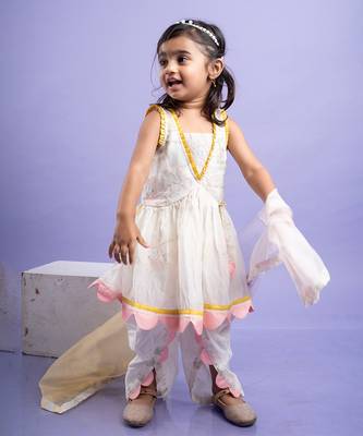 Charming white dhoti-style set with floral embroidery and playful yellow and pink accents, perfect for festive occasions 1