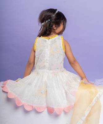 Charming white dhoti-style set with floral embroidery and playful yellow and pink accents, perfect for festive occasions 3