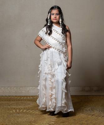 Elegant ivory one-shoulder gown with cascading ruffles and sequin embellishments 1