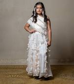 Elegant ivory one-shoulder gown with cascading ruffles and sequin embellishments