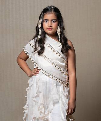Elegant ivory one-shoulder gown with cascading ruffles and sequin embellishments 2