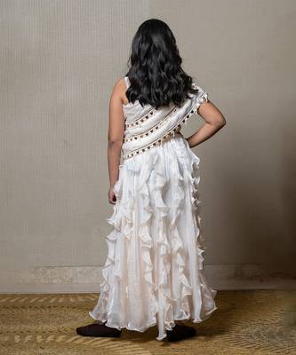 Elegant ivory one-shoulder gown with cascading ruffles and sequin embellishments 4