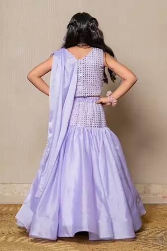 Elegant lavender mermaid gown with sparkling embellishments and a draped neckline
