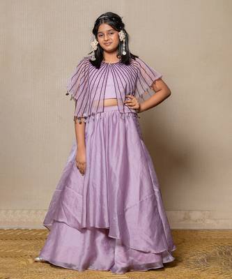 Elegant lavender ensemble with a beaded cape and layered skirt 1