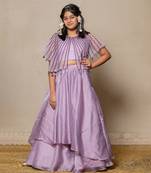 Elegant lavender ensemble with a beaded cape and layered skirt