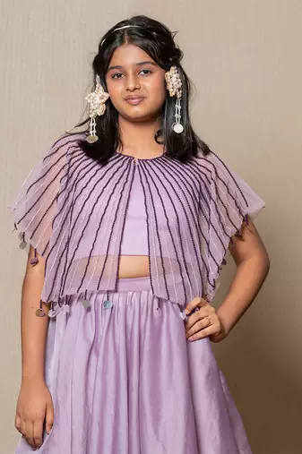 Elegant lavender ensemble with a beaded cape and layered skirt